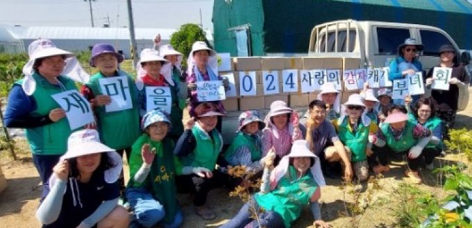 오성면 새마을남녀지도자협의회 사랑의 감자 캐기 행사